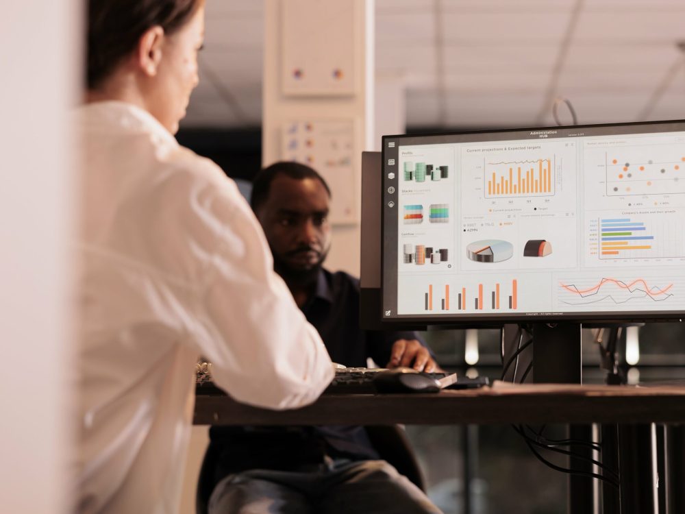 employee-analyzing-company-financial-report-dashbo-2025-02-19-21-17-47-utc-min